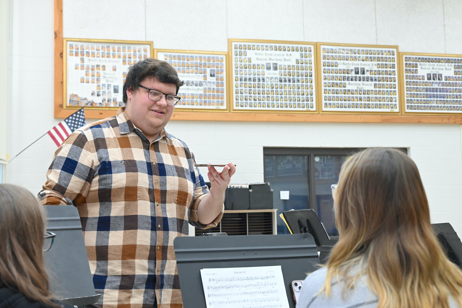 Fred Jankowski, Director of Bands at Battle Creek Central High School, works with students during a recent rehearsal.