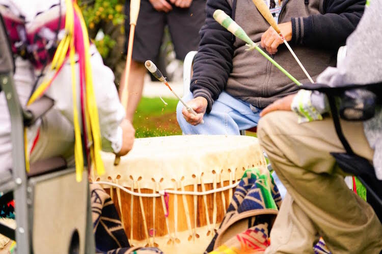 A Drum Song is performed by Tribal Members before the ceremonial restocking of Wild Rice in the Kalamazoo River, during a 2016 Tribal Water Workshop.