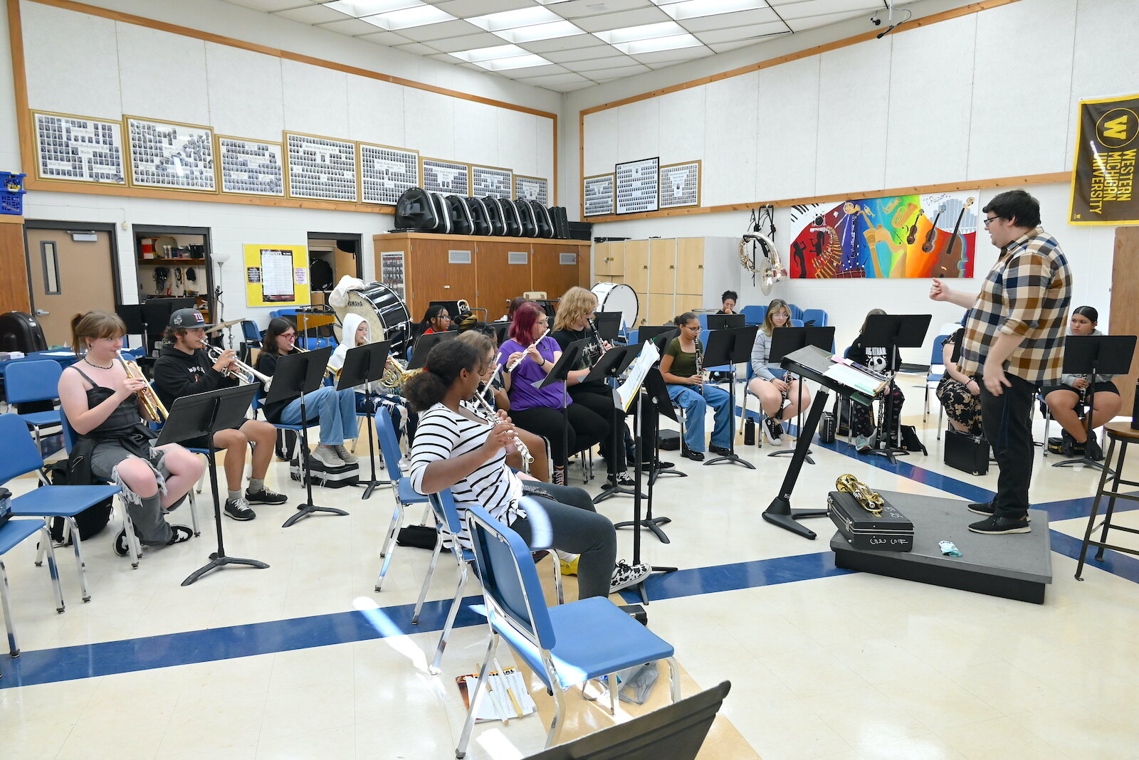  Fred Jankowski, Director of Bands at Battle Creek Central High School, works with students during a recent rehearsal.