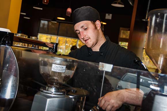 Patrick working behind the counter