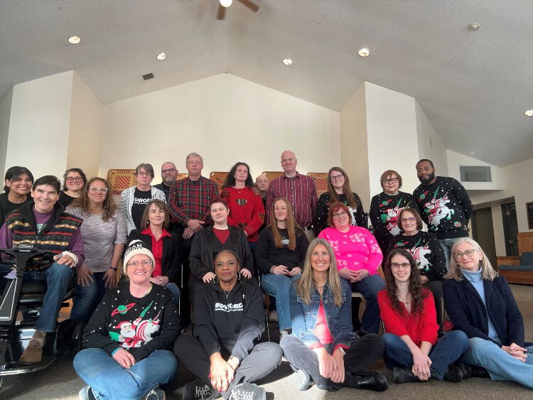 The Disability Network Southwest Michigan team poses for a holiday photo.