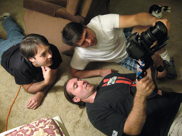 Director Bannon Backhus oversees filming, as actor John Kasdorf lends an extra hand to cinematographer Dane Covey.