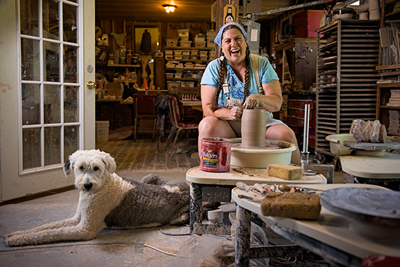 Dawn Soltysiak and her dog Samson work at Khnemu Studio