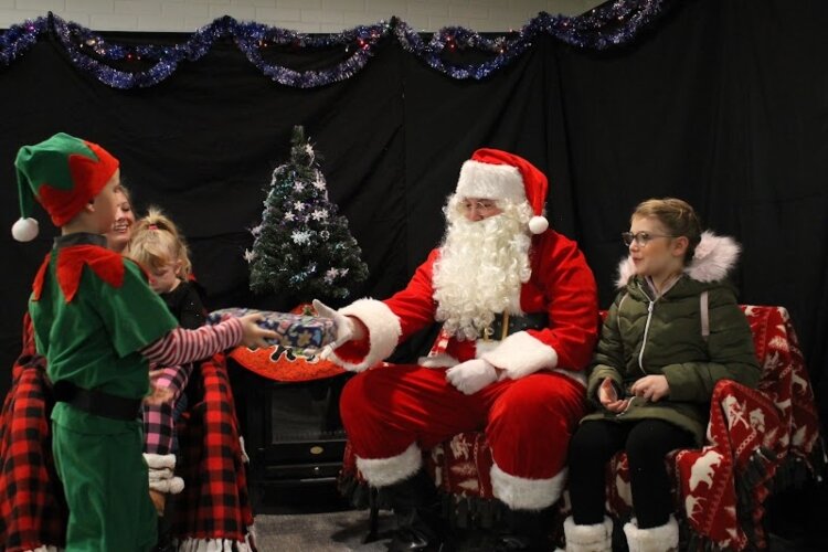 Children who attend the Signing Santa event receive a gift. (DHHS)