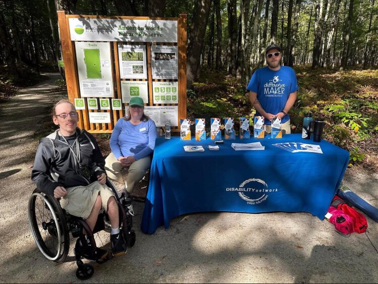 Walk and Roll Through Anderson Woods Nature Preserve with the Land Conservancy of West Michigan. Pictured from left to right: Jeff VanDyke, Janet Perreault, and Brad Hastings.