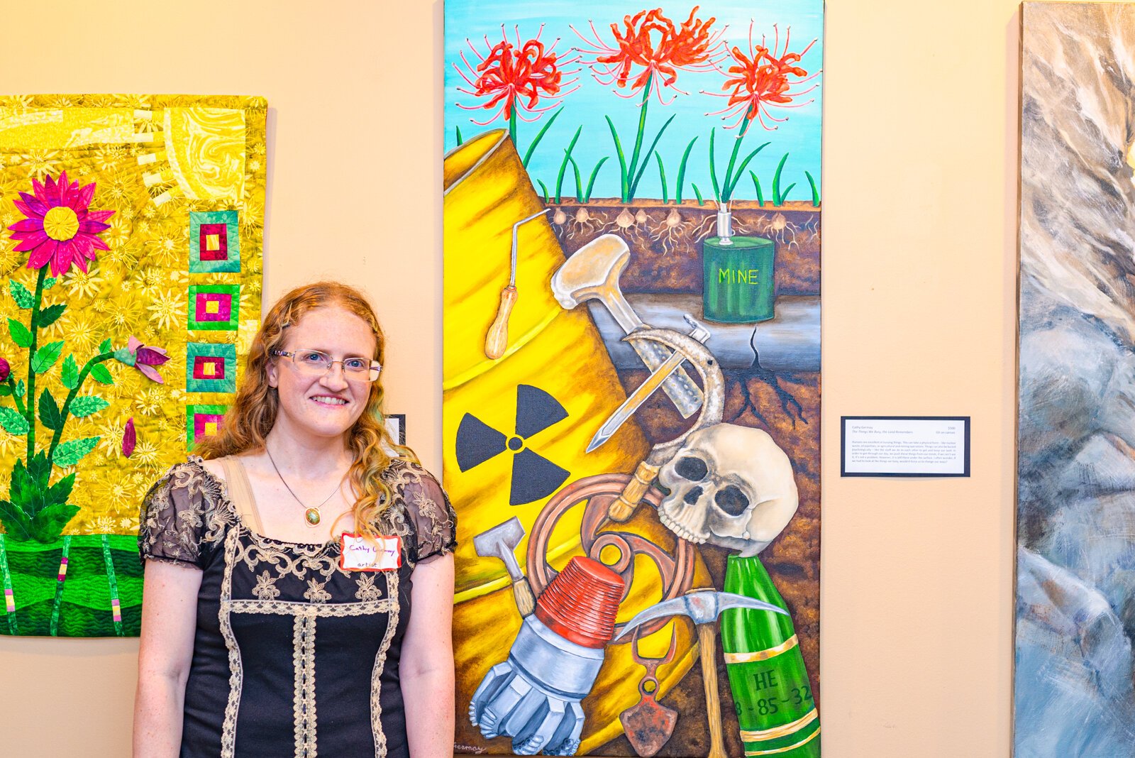 Artist, Cathy Germany with her piece "The Things We Busy, the Land Remembers"