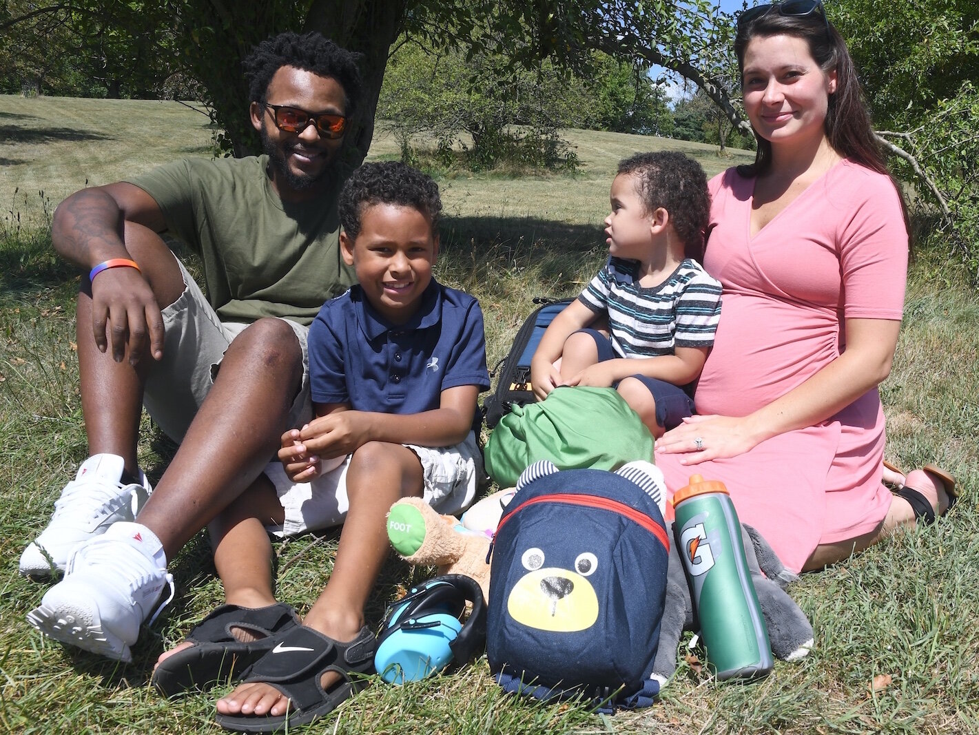 The Hampton family, from left, Bryon, Davin, and Greyson, held by Audrina.