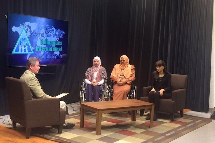 When disability rights advocates from north Africa and the Middle East met with the Disability Advocates of Kent County two of the women received new wheelchairs.  There are seen here with a visually disabled lady from Israel. 