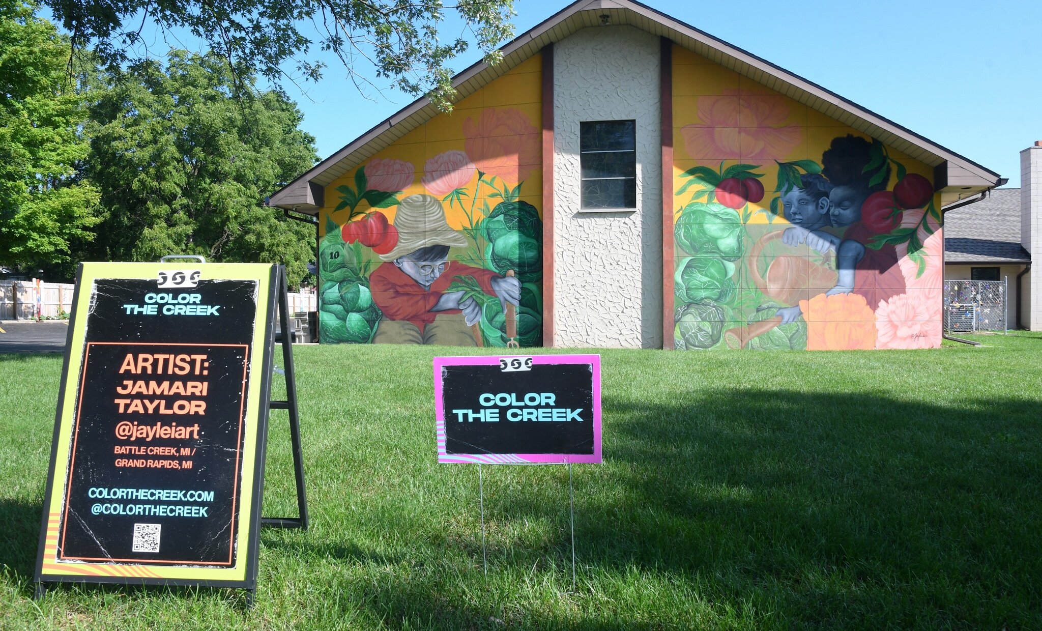 Jamari Taylor of Battle Creek and Grand Rapids painted this mural on one of the walls of Trinity Neighborhood Center on Bidwell Street.