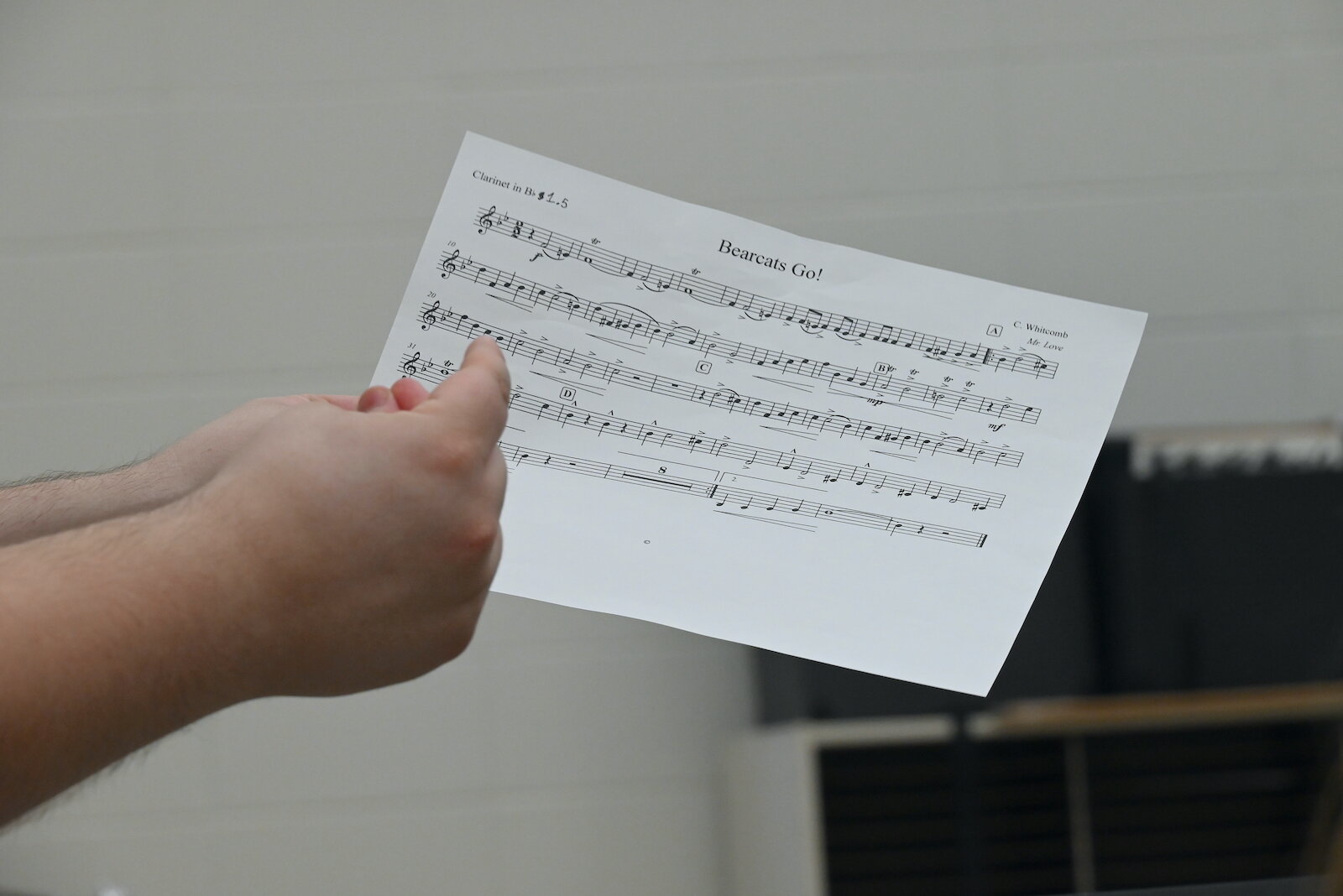 Fred Jankowski, Director of Bands at Battle Creek Central High School, works with students during a recent rehearsal.