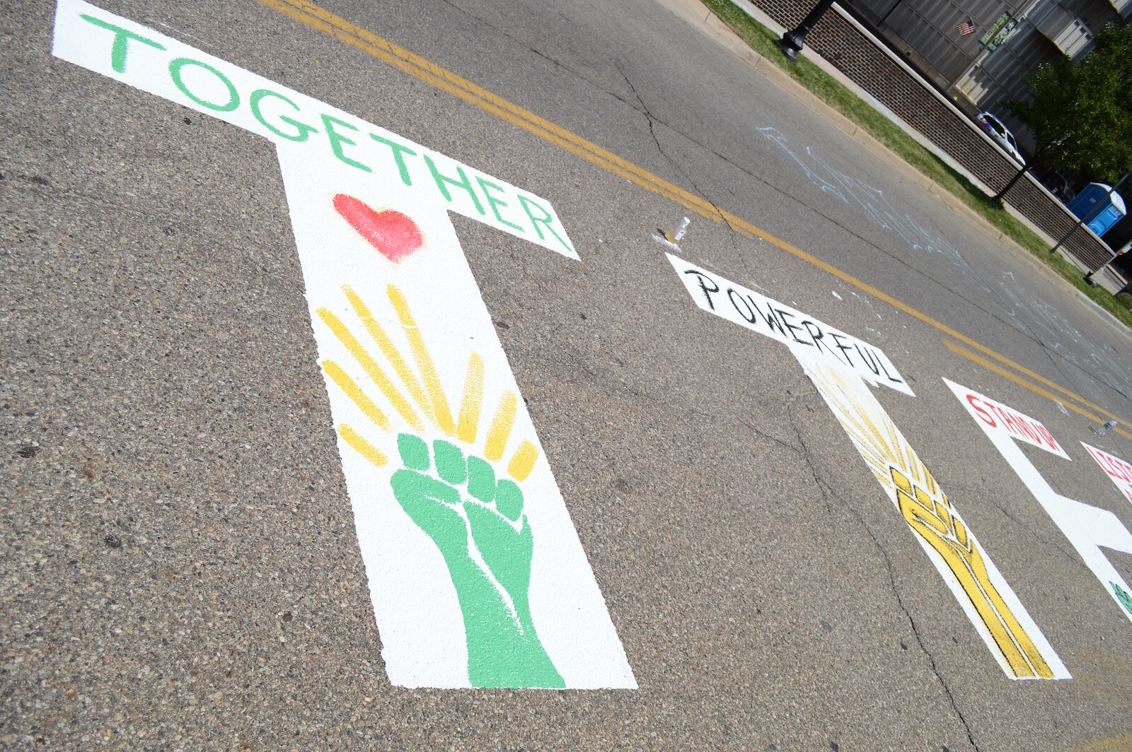 Artists were downtown creating Kalamazoo Black Lives Matter street art, June 19. 