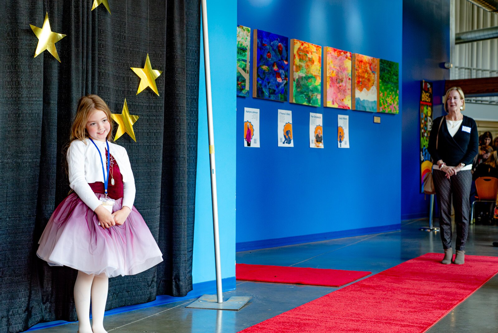 Lily from Ada Elementary takes a Portrait on the Red Carpet.