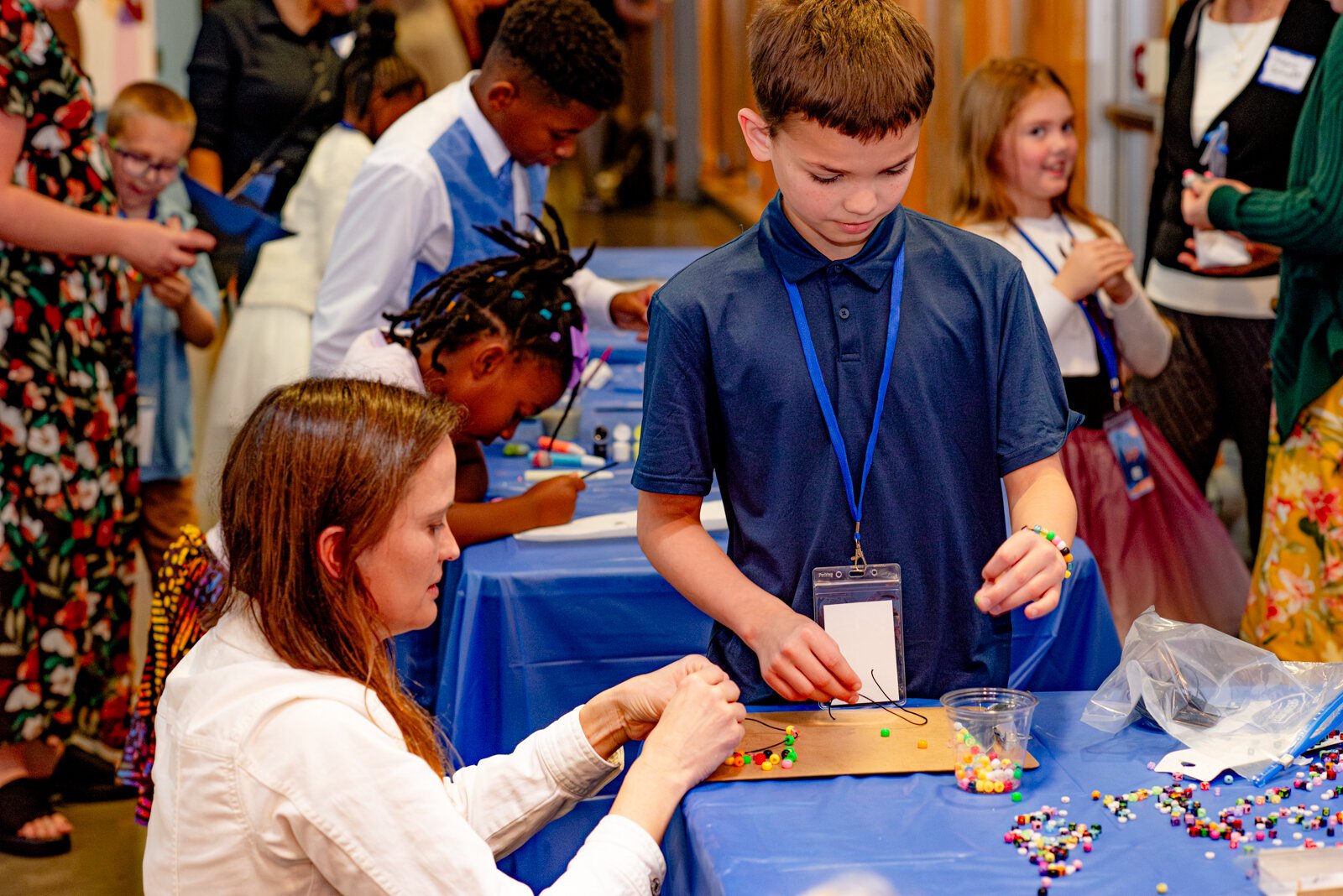 VIPs enjoying the Bracelet Station.