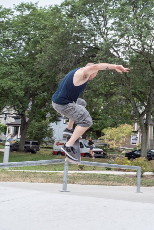 Skateboarders at the Davis Street Skate Plaza provide daylong entertainment for those who pass by.