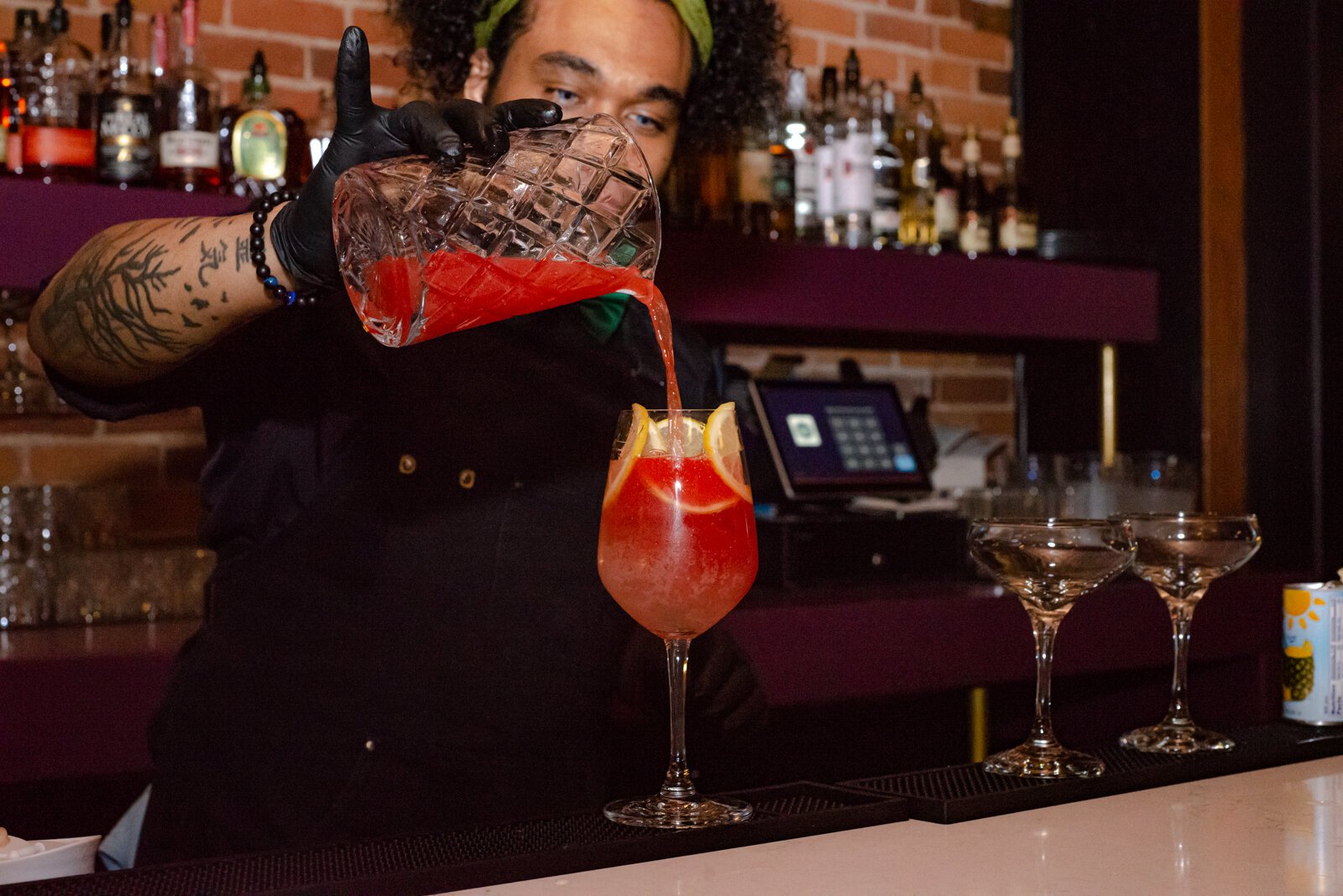 Bartender Killian Ongonian serves up Dabney and Co.'s signature drins.