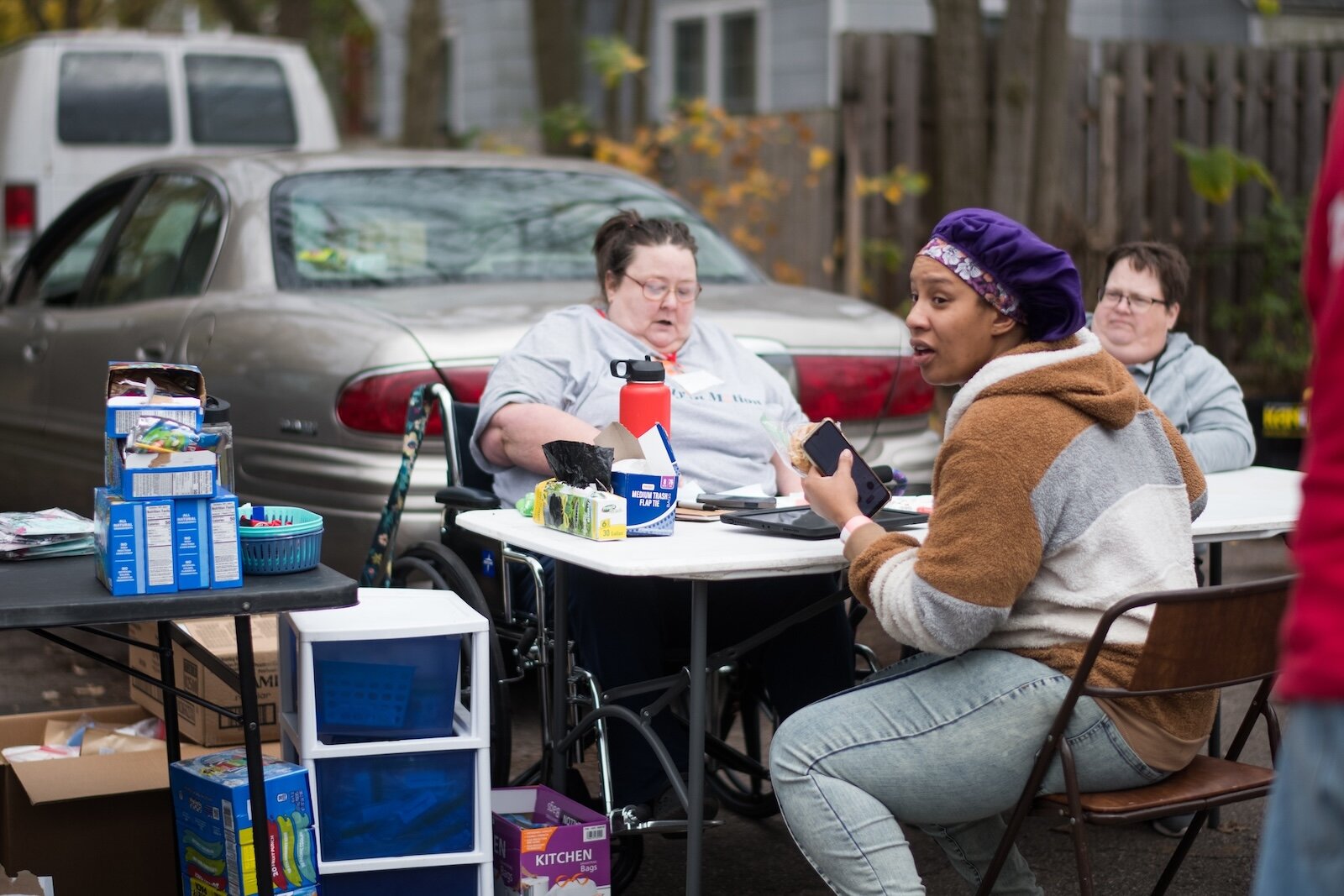 udy Lowery signs up people for Soap and Hope. 