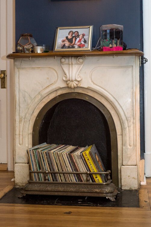 The Dannisons love the historic details in their home, including the original marble fireplace
