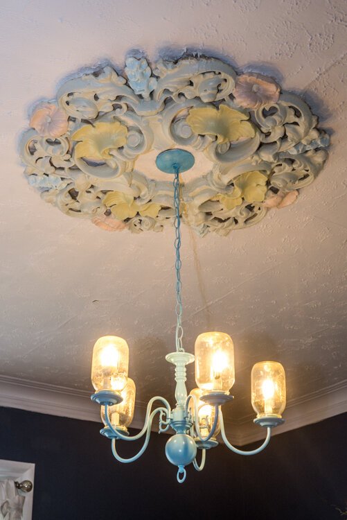 This original rococo molding was repainted to match original house colors by Nathan Dannison.