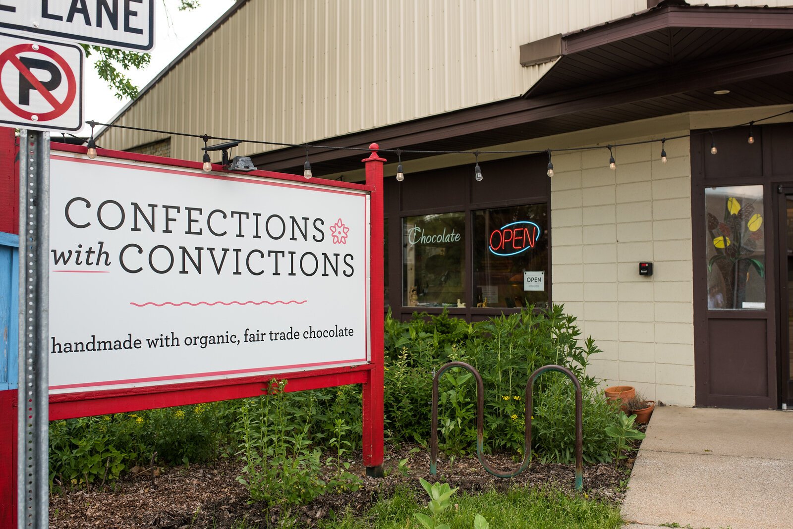 The outside of Confections with Convictions at  116 W Crosstown Pkwy #101
