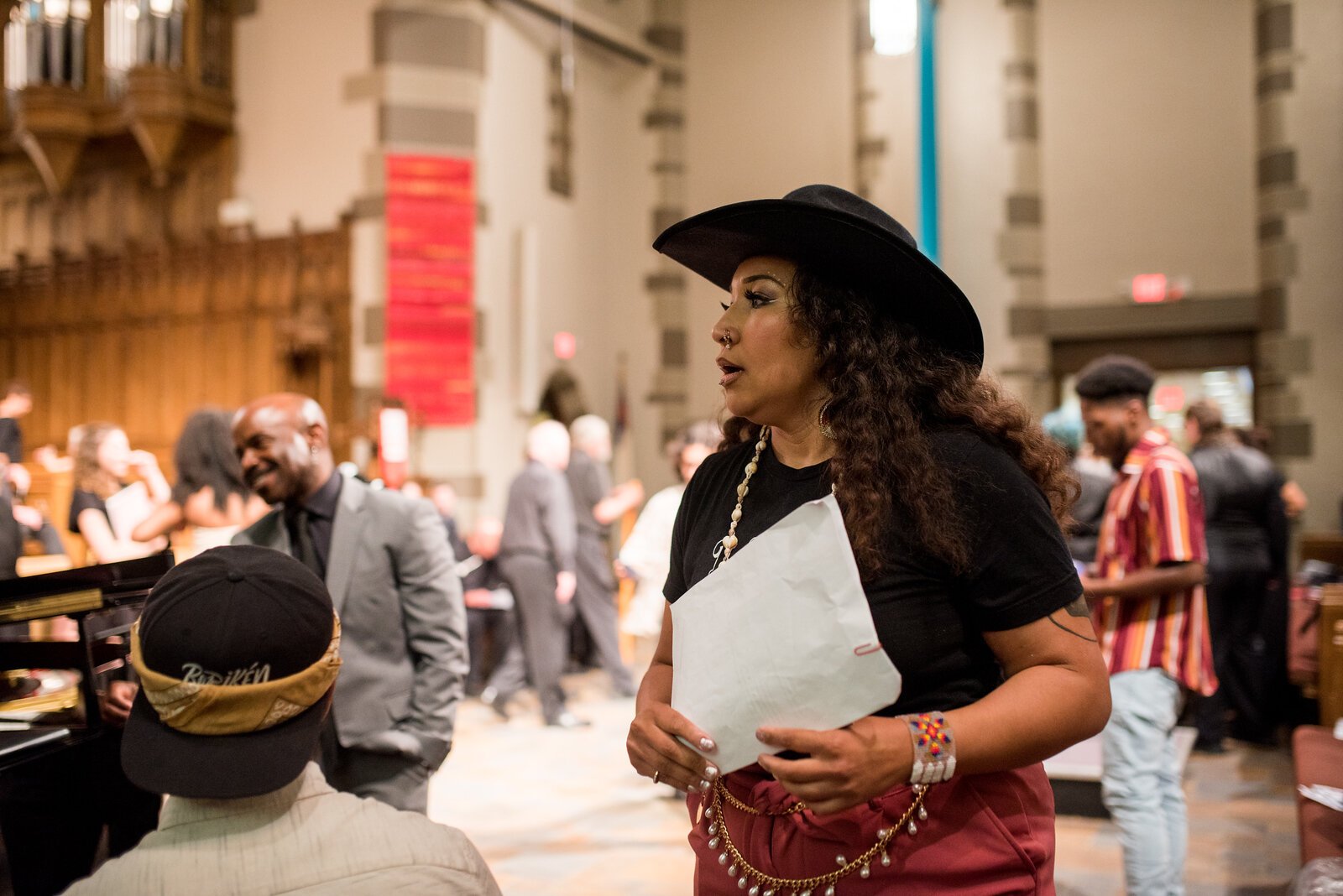 Monica Washington Padula, who is of Afro-Anishinaabe heritage, recited a tearful, poetic tribute to her Indian grandmother. 