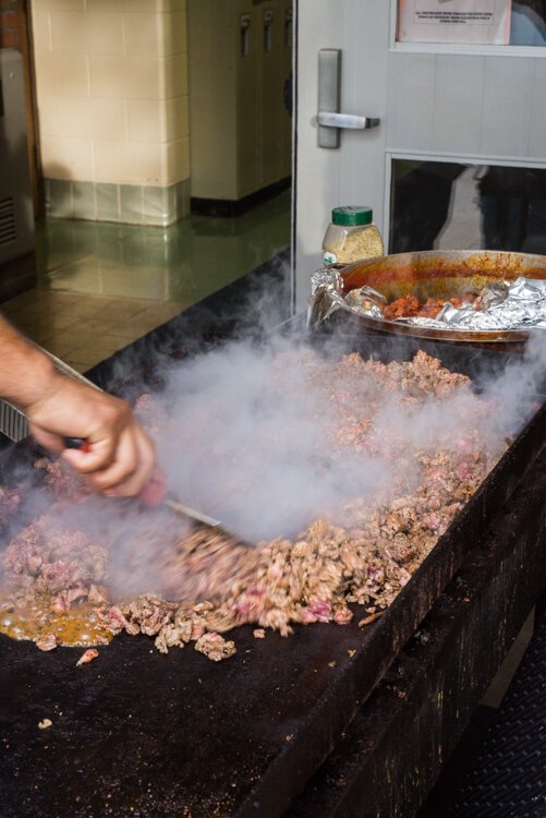 Parents, teachers and students are busy cooking and serving during the popular Taste of El Sol.