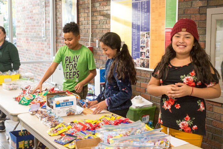 El Sol students enjoy selling snacks to attendees during the Taste of El Sol.