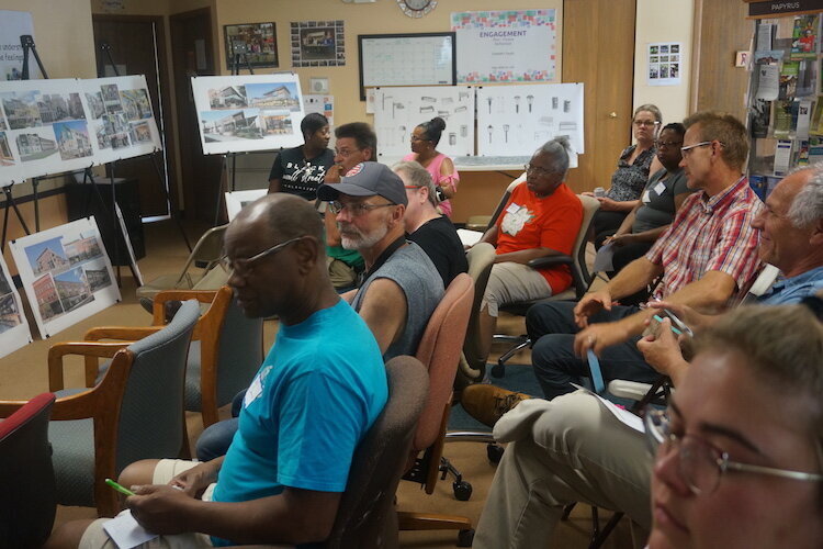 Eastside residents offer ideas during one of several special meetings to create a concept for the redevelopment of the 1600 block of East Main Street.