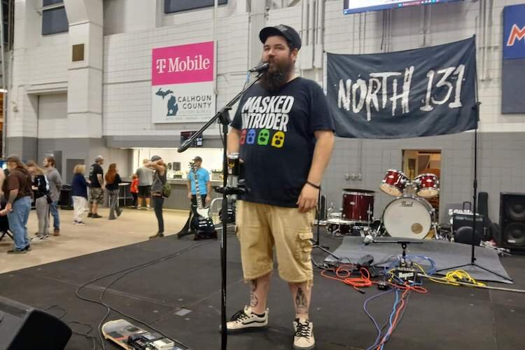 Punk Rock Flea Market Organizer Adam Brandt speaks at the event.