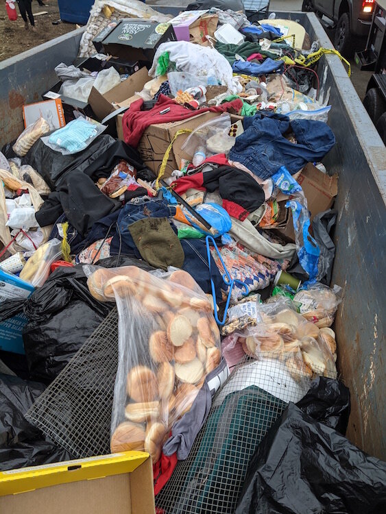 Trash and other waste is an ongoing problem at the homeless encampments. Shown here are food items and clothing that well-intentioned people left at a campsite. Left outdoors and without an explanation, people don't often know if food is still fresh.