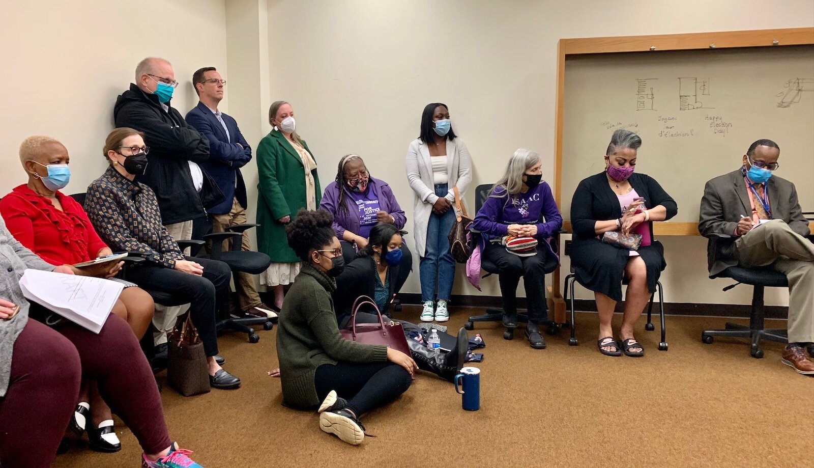 About 25 people turned out on Wednesday, May 4, 2022, to support of Tami Rey, whose candidacy for re-election to the Kalamazoo County Board of Commissioners was questioned over the last few days.