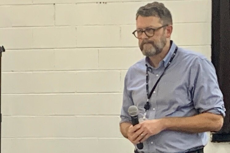 Michael Cockrell, interim director of the Kalamazoo Public Library, speaks at the Oct. 29, 2024 town hall meeting at NACD.