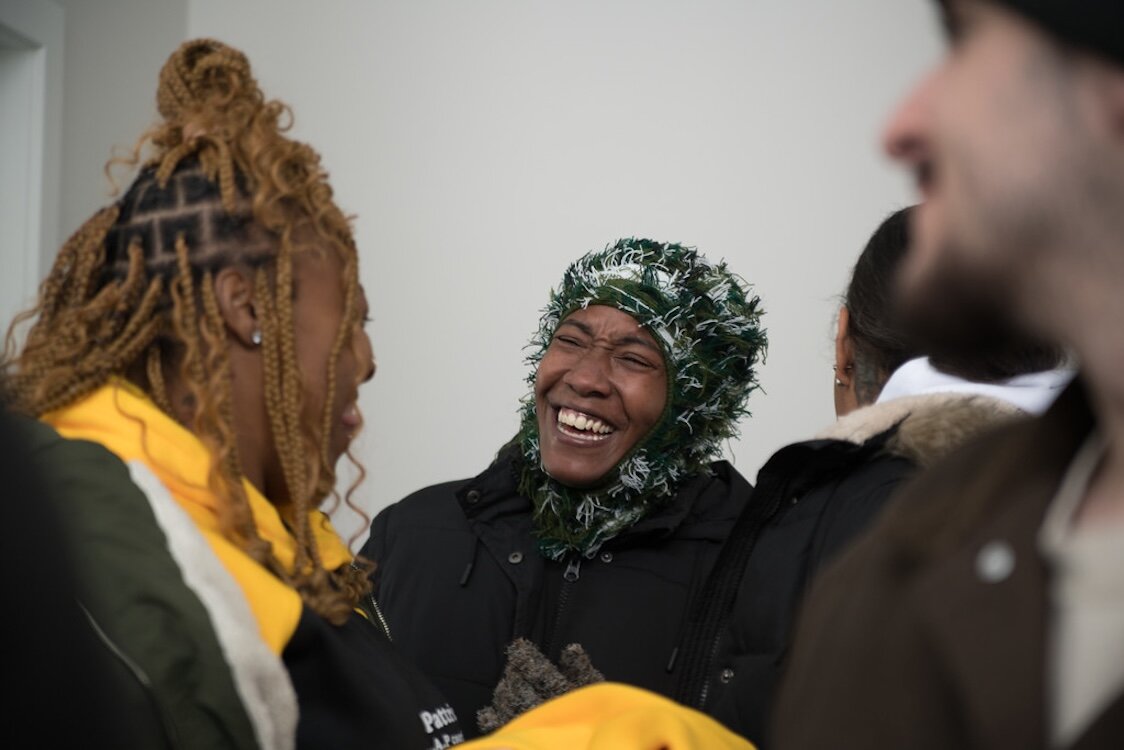 Aubrey Flowers and Patrice Fuller enjoy a moment at the Dec. 12, 2024 open house of the HOPE Thru Navigation tiny houses.