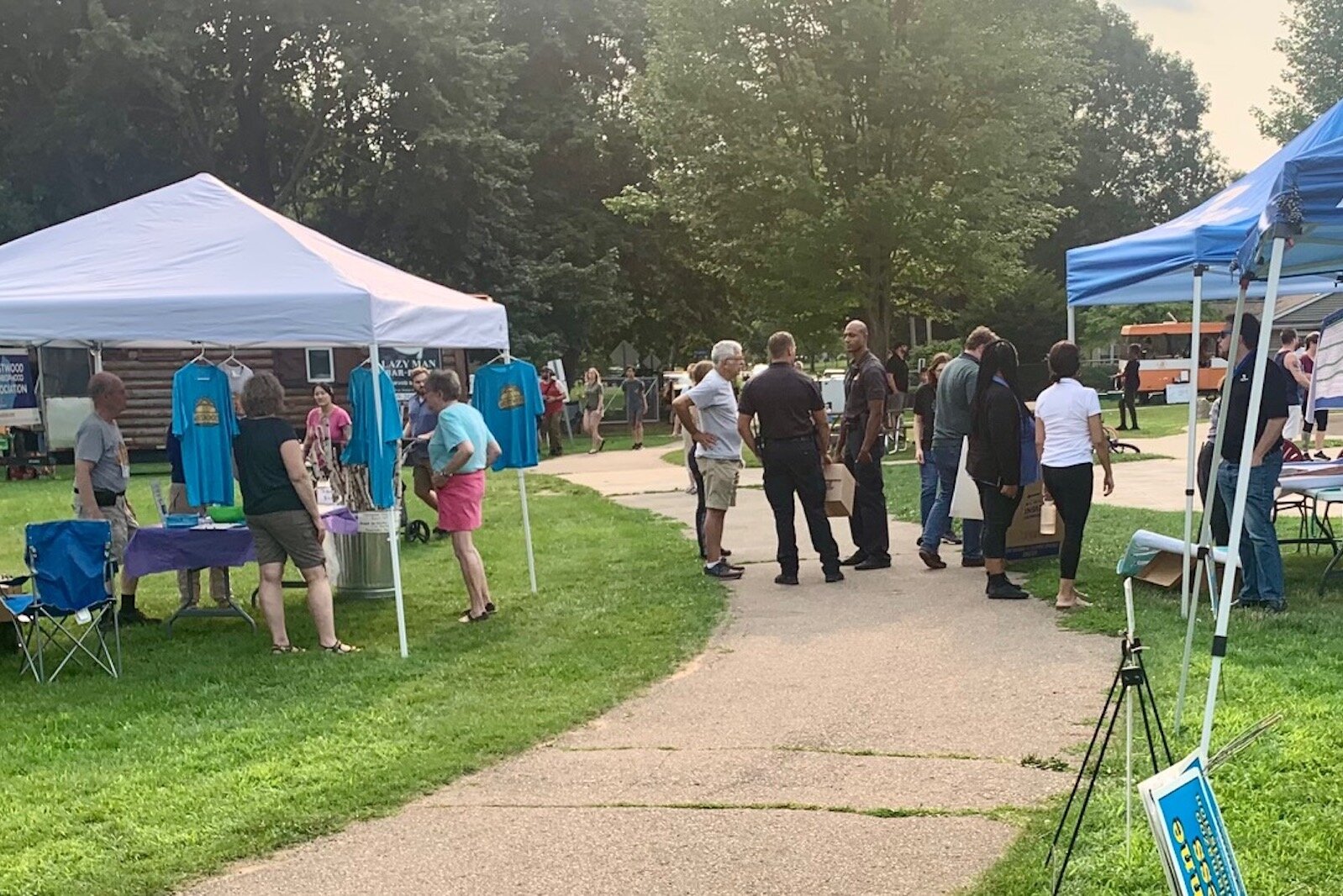 Families strolled from one information tent to another during the Westwood Neighborhood’s National Night Out, held Tuesday in Frays Park.