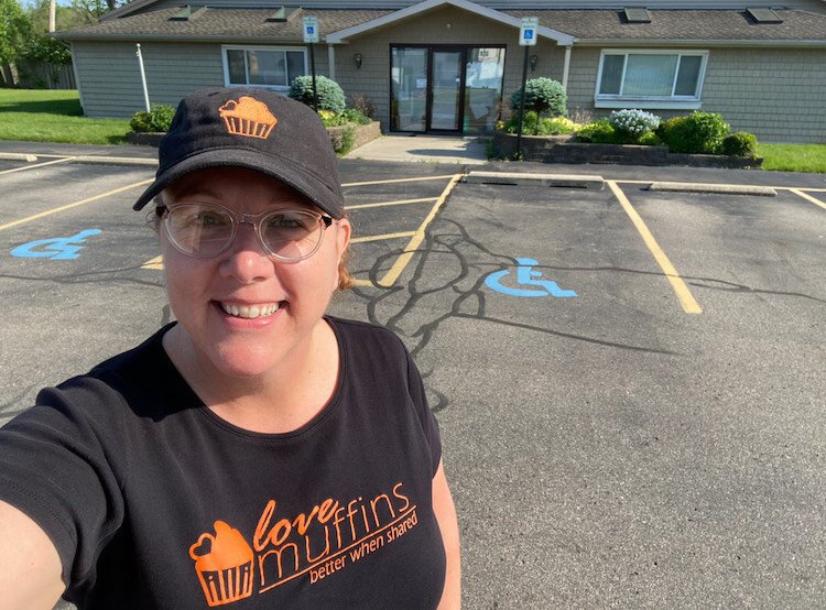 Eileen Pawlicki, Love Muffins owner, outside of the company's new location at the former Boonzaaijer Bakery