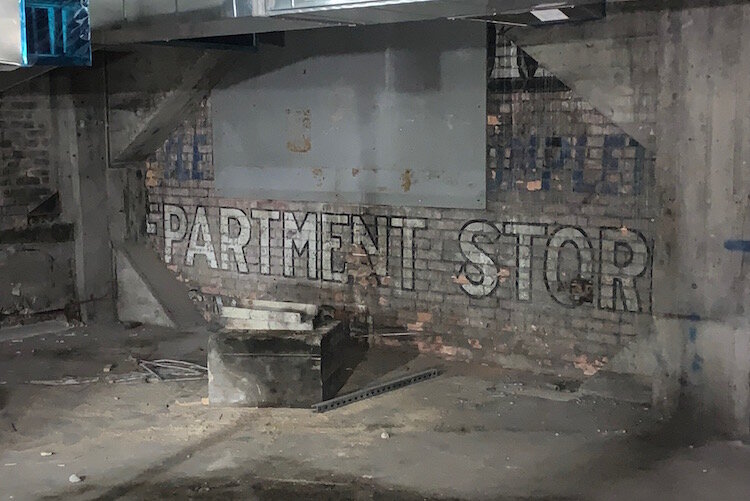 A sign for a long lost department store is still visible inside The Milton.