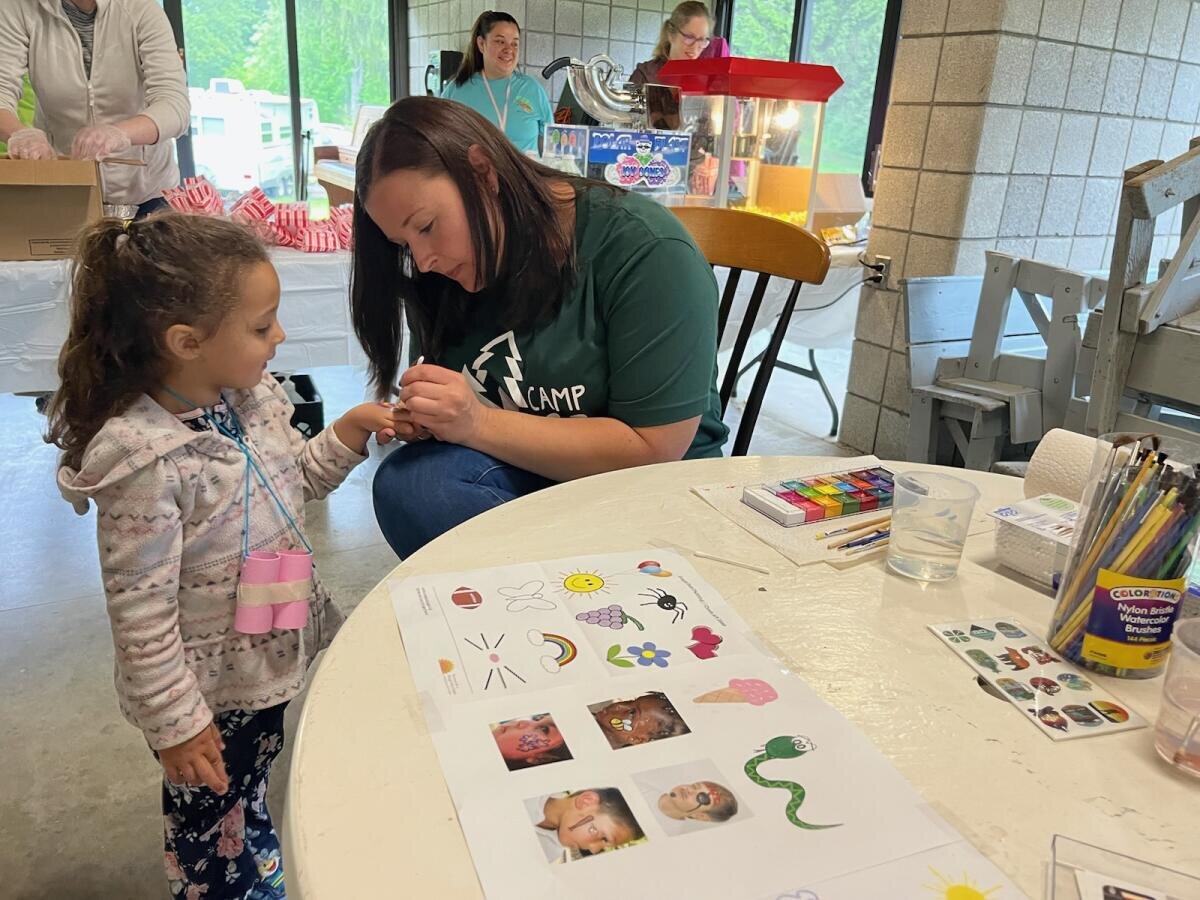 Teachers enjoy interacting with the students while celebrating the end of a successful head start year 