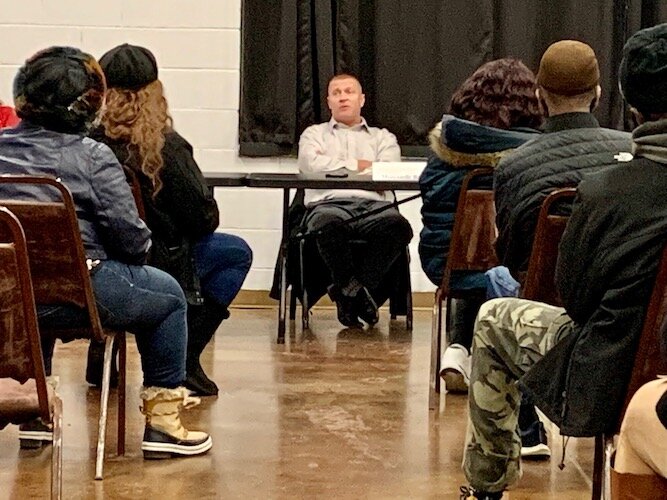 Jim Kingsley, mortgage market manager for Mercantile Bank, answers questions for prospective homeowners add a Dec. 7, 2021 Affordable Housing meeting at the Northside Association for Community Development.