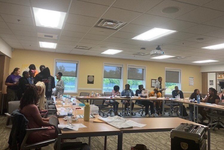 The youth advisory team of the Community Peace Project meets after school to work on projects that help heal the community from impacts of gun violence.