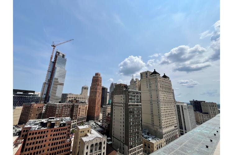 The view from Kamper's Rooftop Bar shows that Detroit is still changing. Sticking out among the old skyscrapers is the shiny Hudson's Detroit building, now the second tallest (after the Renaissance Center) building as it nears completion.