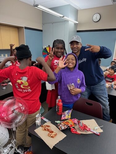 Damon Brown, R.I.S.E. founder, enjoying a lunch break with youth participants.