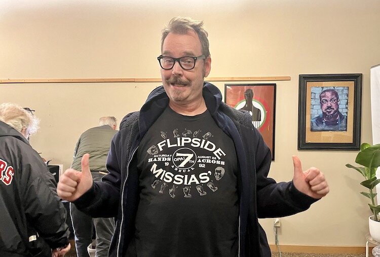 Matthew Sahlgren, a former Flipside clerk, in his 1992 Hands Across Eleanor shirt.