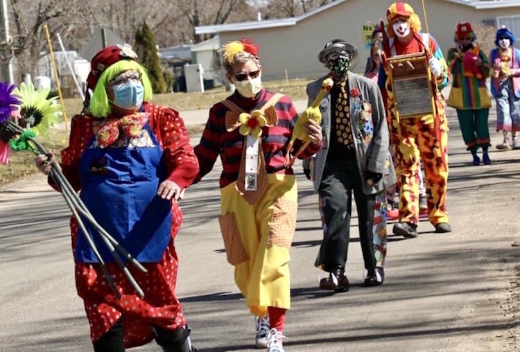 As founding members of the Grand and Glorious Mid-Michigan Galaxy of Clowns, Sally and Jerry Campbell were treated to a surprise parade of clowns on March 21, outside their home in Plainwell.