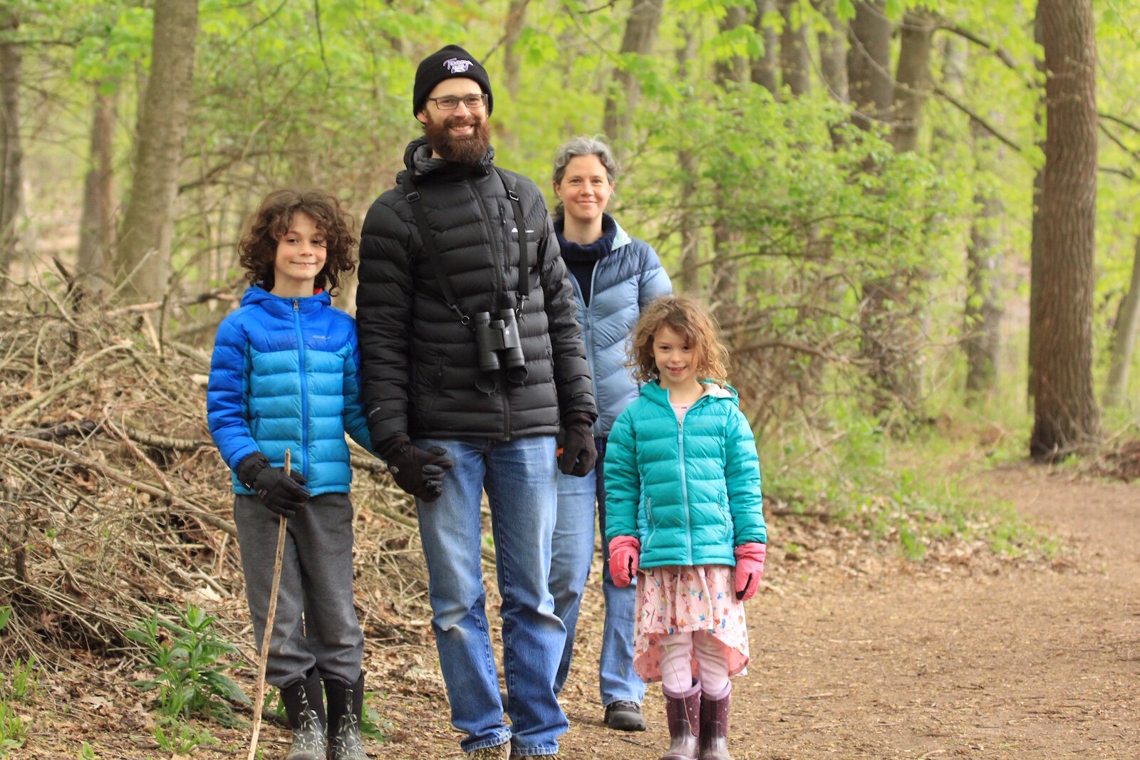 Members of the Mesch-Carinci family take a walk through the Kleinstuck Preserve. The family includes, from left, Luca Mesch-Carinci, Justin Carinci, Susan Mesch, and Petra Mesch-Carinci.