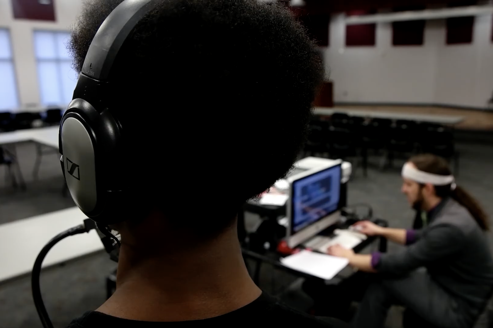 Music therapist Louie Morand, right, records music performed by a member of one of his regular music therapy sessions with court-involved youth in Kalamazoo.