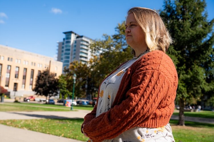 Mackenzie Grace Hatfield reflects on her living situation while at Bronson Park in Kalamazoo, Michigan, on Wednesday, Oct. 16, 2024. 