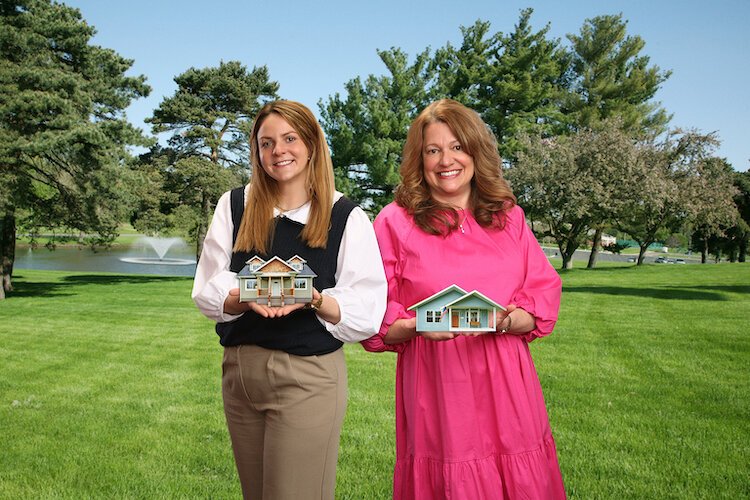 Willa DiTaranto and Mary Balkema point to new mobile homes they helped make available at the Sugarloaf mobile home park in Schoolcraft near Portage as one way to stretch millage dollars on affordable housing.