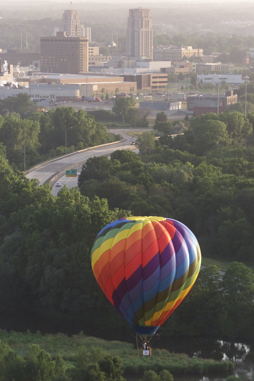 During 2002’s Field of Flight I was lucky enough to hitch a balloon ride and was looking in right direction when this moment came. I was working at the Battle Creek Enquirer at the time.