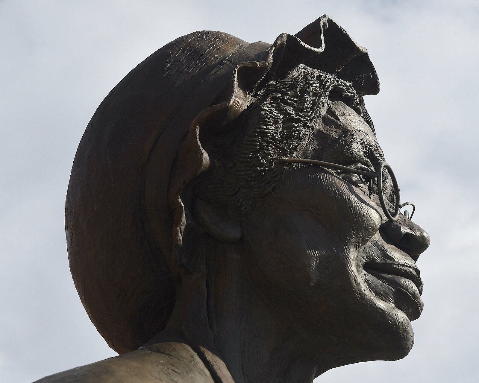 Side view of the sculpture of the head of Sojourner Truth at Monument Park in downtown Battle Creek.