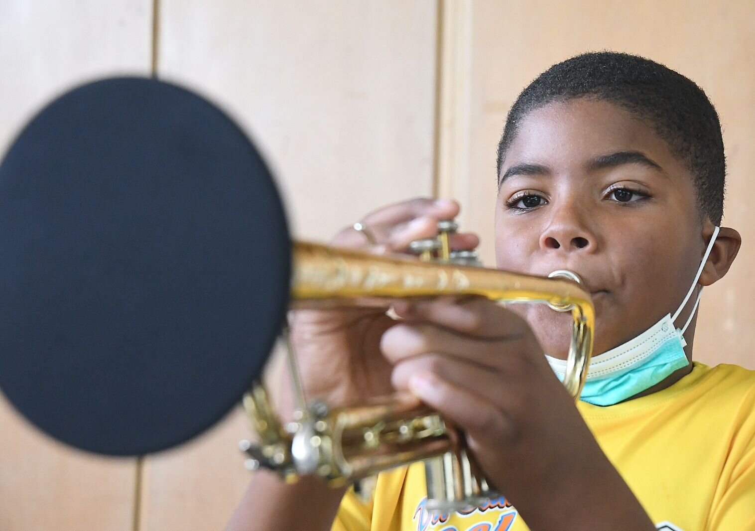 Micheal Prude, a sixth grade student at Northwestern Middle School, practices his trumpet in music class.