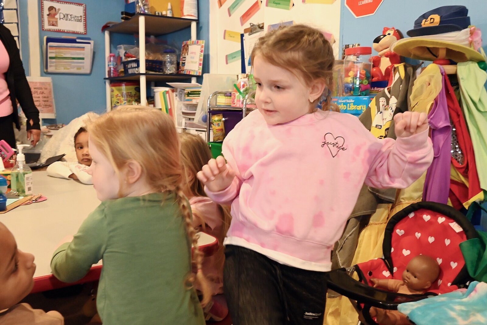 Kora Kelly counts other children at Kim’s Kiddie Korner Childcare.